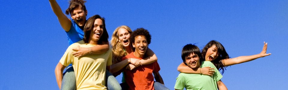 Diverse group of young people celebrating